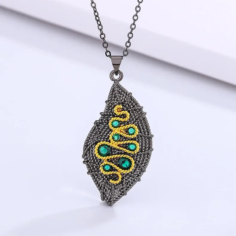 1. Serpentine, Black Gold Style Pendant Necklace