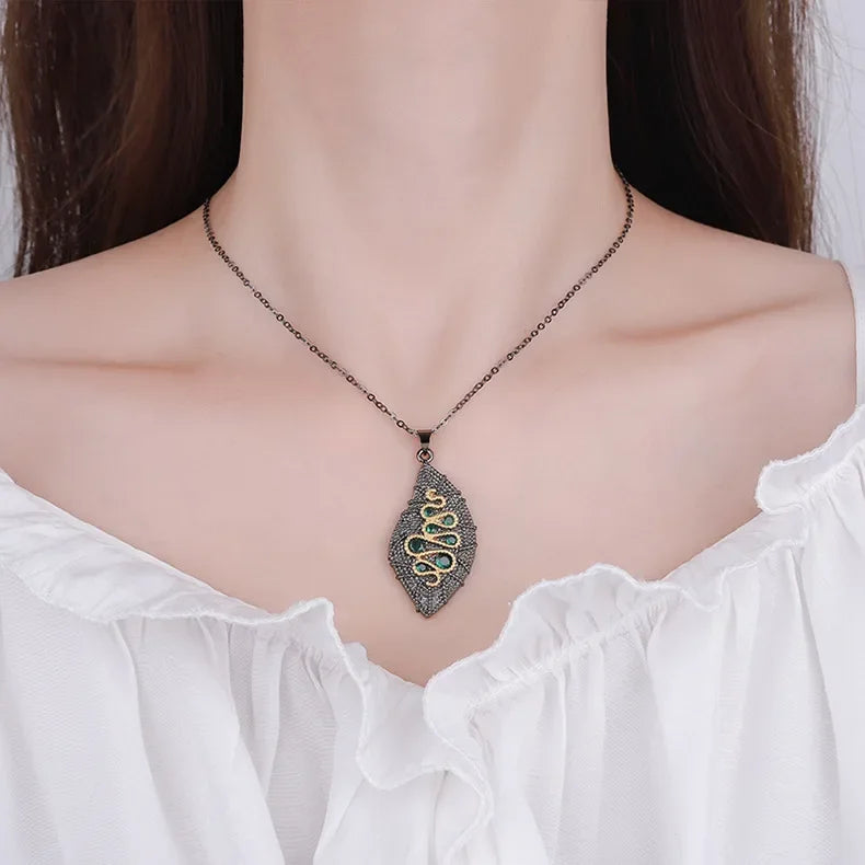 1. Serpentine, Black Gold Style Pendant Necklace